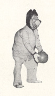 Archival scan: Oski holding a basketball. Photo credit: Photographer/artist uncredited in supplied scan.