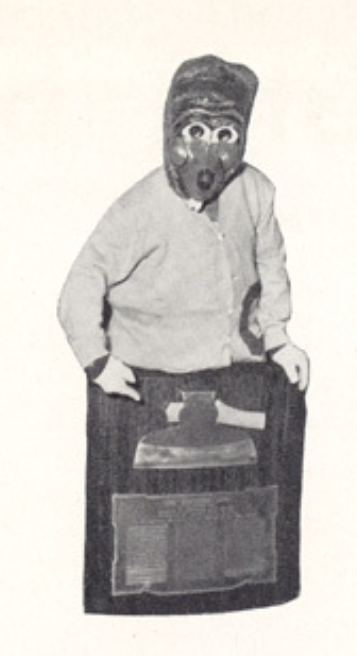 Archival scan: Oski posing with the Axe. Photo credit: Photographer/artist uncredited in supplied scan.